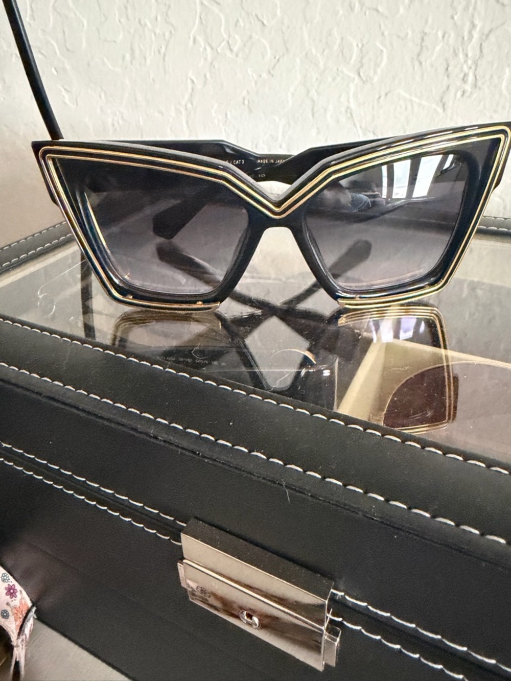 Valentino Garavani Black Cat-Eye Sunglasses with Gold Accents